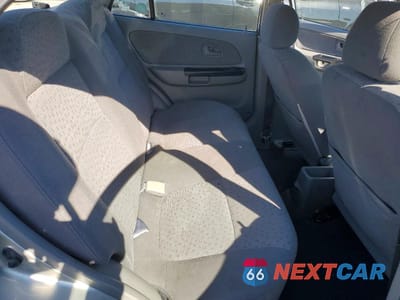 Zdjęcie 10 z 12 samochodu: 2003 KIA RIO BASE VIN:KNADC125936228228 - miniatura