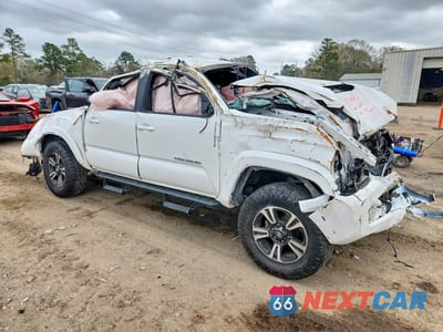 Czwarte zdjęcie samochodu z boku: 2019 TOYOTA TACOMA TRD SPORT VIN:3TMCZ5AN6KM208006 - miniatura