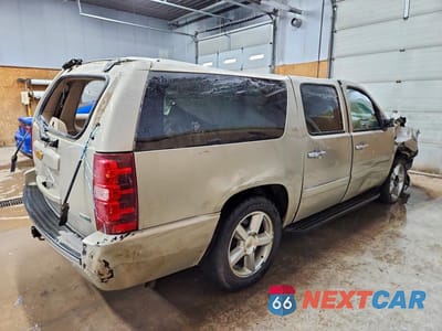 Trzecie zdjęcie samochodu z tyłu: 2012 CHEVROLET SUBURBAN K1500 LTZ VIN:1GNSKKE71CR130395 - miniatura