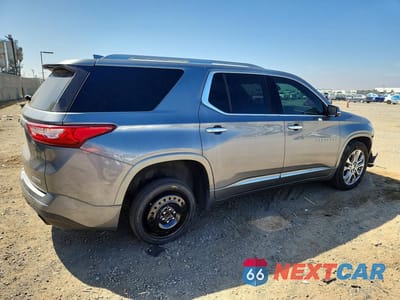 Trzecie zdjęcie samochodu z tyłu: 2018 CHEVROLET TRAVERSE PREMIER VIN:1GNERKKW8JJ111231 - miniatura