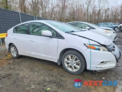 Czwarte zdjęcie samochodu z boku: 2010 HONDA INSIGHT EX VIN:JHMZE2H74AS032587 - miniatura