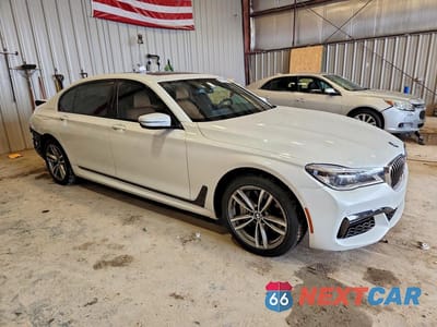 Czwarte zdjęcie samochodu z boku: 2017 BMW 750 XI VIN:WBA7F2C57HG422718 - miniatura