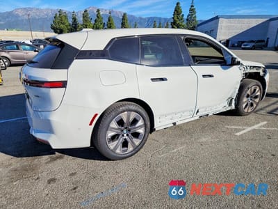 Trzecie zdjęcie samochodu z tyłu: 2026 BMW IX XDRIVE45 VIN:WB543CF04TCV02588 - miniatura