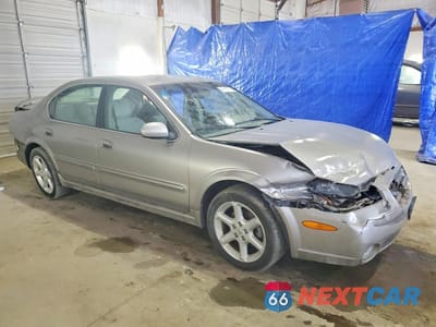 Czwarte zdjęcie samochodu z boku: 2002 NISSAN MAXIMA GXE VIN:JN1DA31D22T424785 - miniatura
