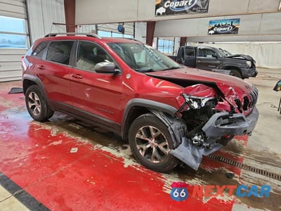 Czwarte zdjęcie samochodu z boku: 2015 JEEP CHEROKEE TRAILHAWK VIN:1C4PJMBS4FW500539 - miniatura
