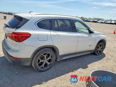 Trzecie zdjęcie samochodu z tyłu: 2018 BMW X1 SDRIVE28I VIN:WBXHU7C3XJ5H40087 - miniatura