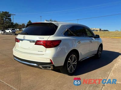Czwarte zdjęcie samochodu z boku: 2019 ACURA MDX TECHNOLOGY VIN:5J8YD4H76KL004749 - miniatura