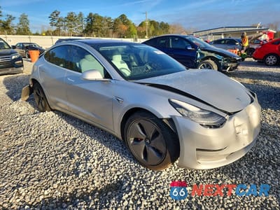 Czwarte zdjęcie samochodu z boku: 2018 TESLA MODEL 3 VIN:5YJ3E1EBXJF074821 - miniatura