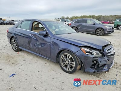 Czwarte zdjęcie samochodu z boku: 2015 MERCEDES-BENZ E 350 VIN:WDDHF5KB4FB124207 - miniatura