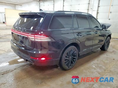 Trzecie zdjęcie samochodu z tyłu: 2024 LINCOLN AVIATOR RESERVE VIN:5LM5J7XC0RGL05698 - miniatura