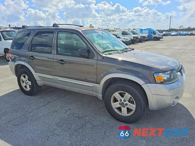 Czwarte zdjęcie samochodu z boku: 2005 FORD ESCAPE HEV VIN:1FMCU96H55KD90961 - miniatura