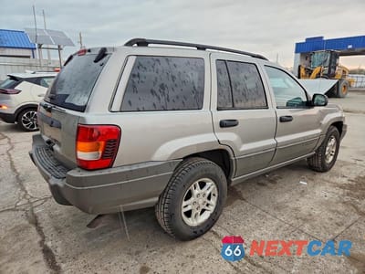 Trzecie zdjęcie samochodu z tyłu: 2002 JEEP GRAND CHEROKEE LAREDO VIN:1J4GW48S92C118408 - miniatura