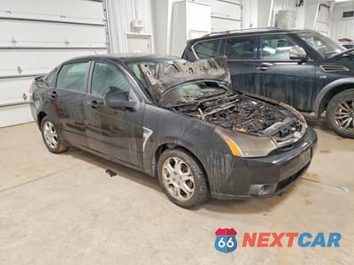 Czwarte zdjęcie samochodu z boku: 2008 FORD FOCUS SE VIN:1FAHP35N48W150955 - miniatura