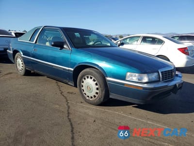 Czwarte zdjęcie samochodu z boku: 1994 CADILLAC ELDORADO VIN:1G6EL12Y0RU615792 - miniatura