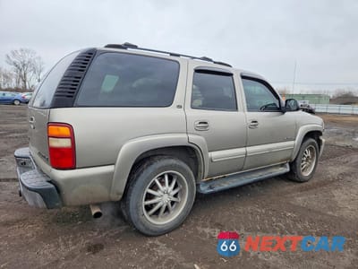 Trzecie zdjęcie samochodu z tyłu: 2002 CHEVROLET TAHOE K1500 VIN:1GNEK13ZX2R274375 - miniatura