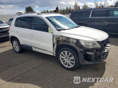 Czwarte zdjęcie samochodu z boku: 2011 VOLKSWAGEN TIGUAN S VIN:WVGAV7AX5BW551417 - miniatura
