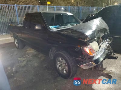 Czwarte zdjęcie samochodu z boku: 1998 NISSAN FRONTIER XE VIN:1N6DD26S3WC359616 - miniatura