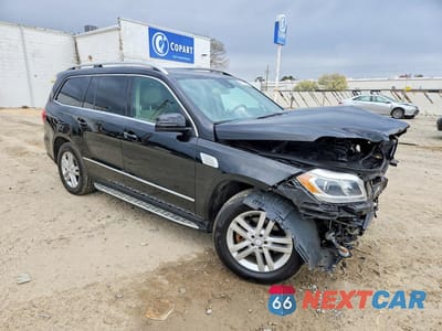 Czwarte zdjęcie samochodu z boku: 2014 MERCEDES-BENZ GL 450 4MATIC VIN:4JGDF7CE7EA424370 - miniatura