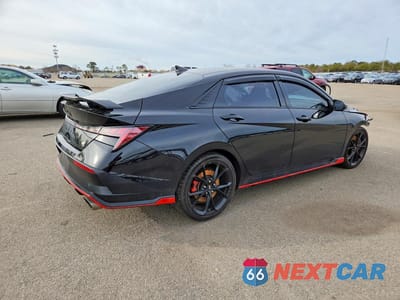 Trzecie zdjęcie samochodu z tyłu: 2024 HYUNDAI ELANTRA N BASE VIN:KMHLW4DK8RU021081 - miniatura