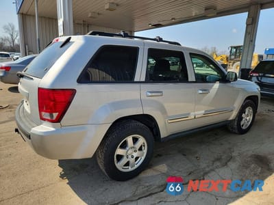 Trzecie zdjęcie samochodu z tyłu: 2010 JEEP GRAND CHEROKEE LAREDO VIN:1J4PR4GK4AC103791 - miniatura