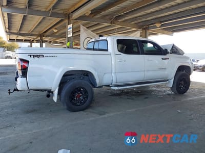 Trzecie zdjęcie samochodu z tyłu: 2016 TOYOTA TACOMA TRD SPORT VIN:3TMBZ5DN3GM004276 - miniatura