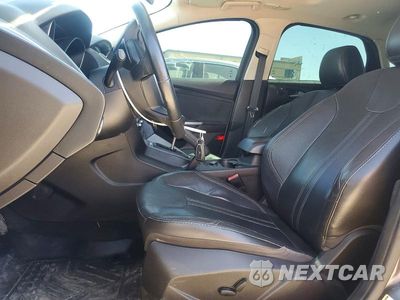 Zdjęcie 7 z 11 samochodu: 2013 FORD FOCUS TITANIUM VIN:1FADP3J2XDL124401 - miniatura