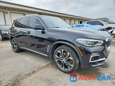 Czwarte zdjęcie samochodu z boku: 2021 BMW X5 XDRIVE45E VIN:5UXTA6C05M9F32422 - miniatura