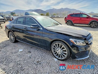 Czwarte zdjęcie samochodu z boku: 2015 MERCEDES-BENZ C 400 4MATIC VIN:55SWF6GB3FU039533 - miniatura