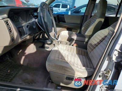 Zdjęcie 7 z 12 samochodu: 1995 JEEP GRAND CHEROKEE LAREDO VIN:1J4GZ58S1SC598053 - miniatura