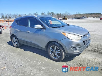 Czwarte zdjęcie samochodu z boku: 2010 HYUNDAI TUCSON GLS VIN:KM8JU3AC3AU071041 - miniatura