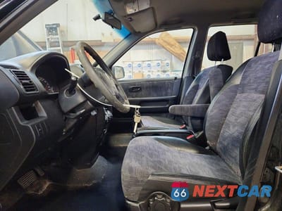 Zdjęcie 7 z 12 samochodu: 2002 HONDA CR-V LX VIN:JHLRD78412C812794 - miniatura