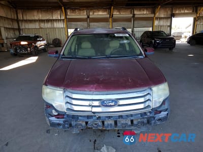 Piąte zdjęcie samochodu w środku: 2008 FORD TAURUS X SEL VIN:1FMDK05WX8GA43025 - miniatura