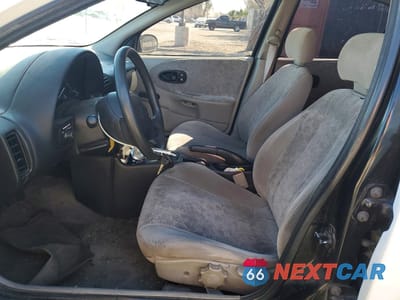 Zdjęcie 7 z 12 samochodu: 1998 SATURN SL2 VIN:1G8ZJ5272WZ251094 - miniatura