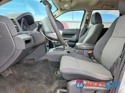 Zdjęcie 7 z 13 samochodu: 2010 JEEP GRAND CHEROKEE LAREDO VIN:1J4PR4GK9AC140349 - miniatura