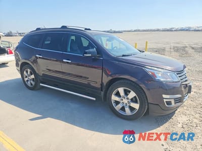 Czwarte zdjęcie samochodu z boku: 2015 CHEVROLET TRAVERSE LTZ VIN:1GNKVJKD5FJ260436 - miniatura
