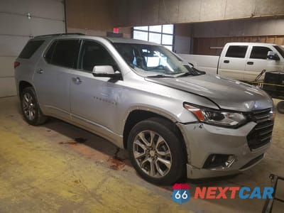 Czwarte zdjęcie samochodu z boku: 2019 CHEVROLET TRAVERSE PREMIER VIN:1GNERKKW6KJ141796 - miniatura