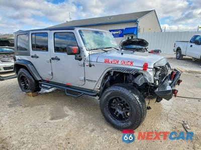Czwarte zdjęcie samochodu z boku: 2015 JEEP WRANGLER UNLIMITED SPORT VIN:1C4BJWDG0FL742678 - miniatura