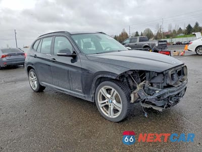 Czwarte zdjęcie samochodu z boku: 2014 BMW X1 XDRIVE28I VIN:WBAVL1C55EVR92959 - miniatura