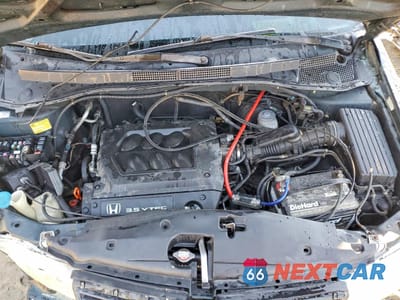 Zdjęcie 12 z 14 samochodu: 2000 HONDA ODYSSEY EX VIN:2HKRL1869YH597192 - miniatura
