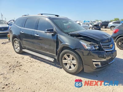 Czwarte zdjęcie samochodu z boku: 2014 CHEVROLET TRAVERSE LT VIN:1GNKRHKDXEJ225807 - miniatura