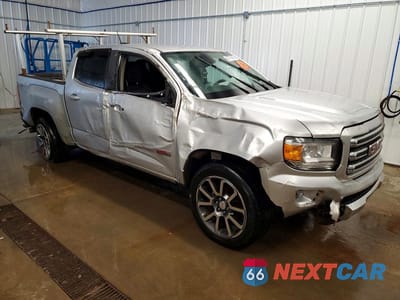 Czwarte zdjęcie samochodu z boku: 2016 GMC CANYON SLE VIN:1GTP6CE19G1383229 - miniatura