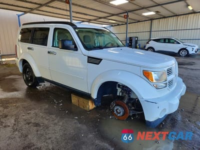 Czwarte zdjęcie samochodu z boku: 2011 DODGE NITRO HEAT VIN:1D4PU4GK9BW598125 - miniatura