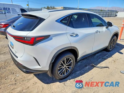 Trzecie zdjęcie samochodu z tyłu: 2024 LEXUS NX 350H PREMIUM VIN:JTJGKCEZ2R2030228 - miniatura