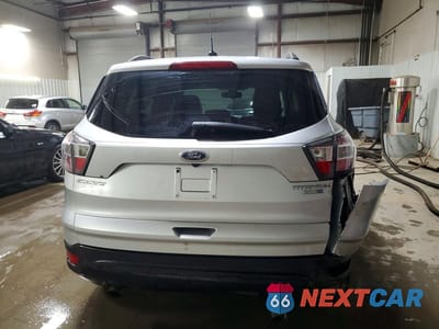 Zdjęcie 6 z 11 samochodu: 2017 FORD ESCAPE TITANIUM VIN:1FMCU9J90HUB41587 - miniatura