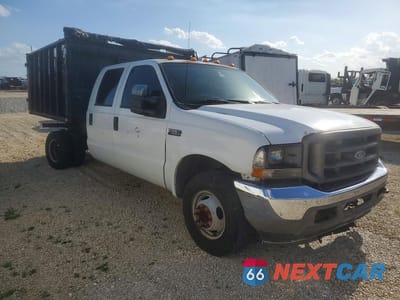 Czwarte zdjęcie samochodu z boku: 2001 FORD F350 SUPER DUTY VIN:1FDWW36SX1EA81253 - miniatura