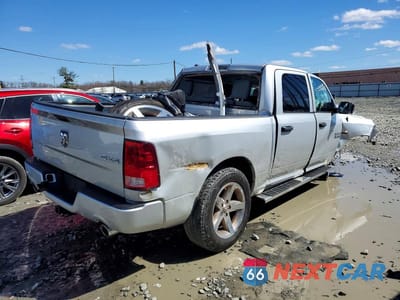 Trzecie zdjęcie samochodu z tyłu: 2016 RAM 1500 ST VIN:1C6RR7KT6GS146275 - miniatura