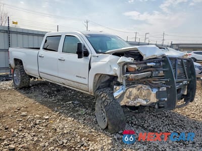 Czwarte zdjęcie samochodu z boku: 2017 CHEVROLET SILVERADO K2500 HEAVY DUTY VIN:1GC1KUEY5HF191704 - miniatura