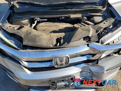 Zdjęcie 12 z 13 samochodu: 2020 HONDA PILOT TOURING VIN:5FNYF5H68LB019425 - miniatura