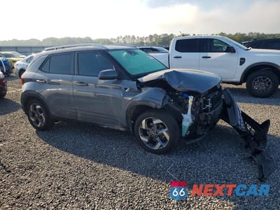 Czwarte zdjęcie samochodu z boku: 2022 HYUNDAI VENUE SEL VIN:KMHRC8A33NU200033 - miniatura