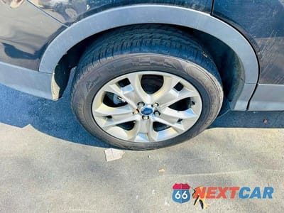Zdjęcie 8 z 10 samochodu: 2014 FORD ESCAPE TITANIUM VIN:1FMCU9J98EUA54984 - miniatura
